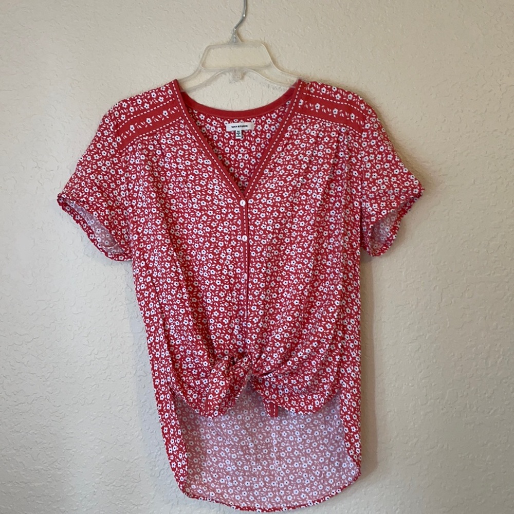 Red floral blouse